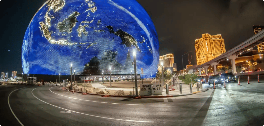 Illuminated spherical venue on the Las Vegas skyline at night, where concierge medical teams support events for InHouse Physicians.